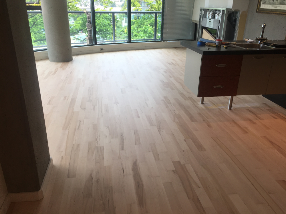 a refinished maple hardwood floor